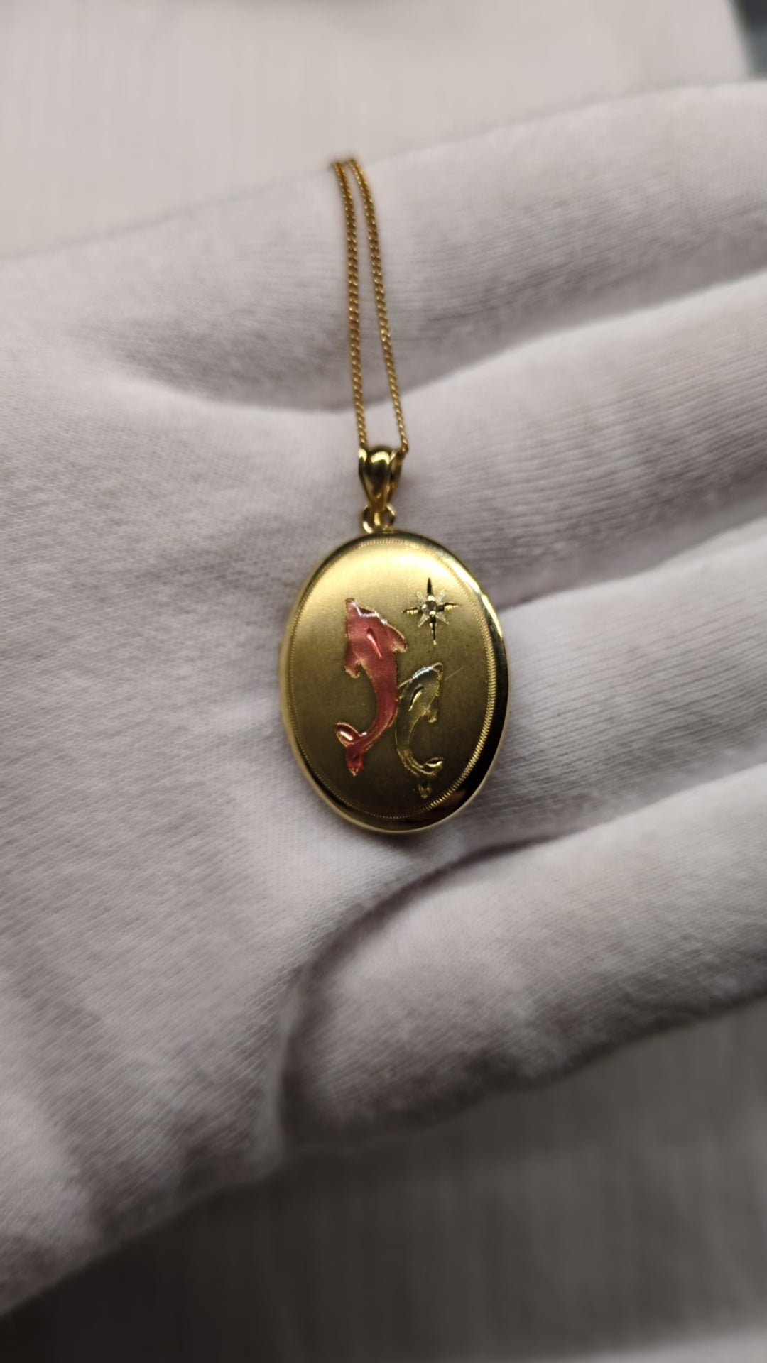 Locket with dolphins Gold plated sterling silver